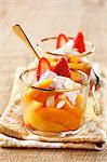 Peach and apricot fruit salad with strawberry mousse