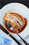 Apple and walnut strudel with toffee sauce