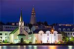 Iceland, Reykjavik, waterfront church on Lake Tjornin