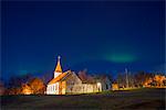Europe, Iceland, Reykjavik, northern lights, aurora borealis above suburban church