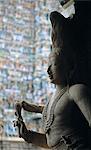 India, Tamil Nadu, Madurai, Sri Meenakshi Temple.    Sandstone figure of a male deity.