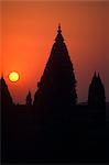 Asia, India, Madhya Pradesh, Orchha.  Sunset over the skyline of Orchha showing the spires of Chaturbhuj temple.