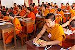 Laos, Luang Prabang. Monks studying hard.