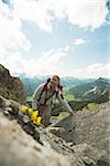 Mature man hiking in mountains, Tannheim Valley, Austria