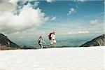 Mature couple hiking in mountains, Tannheim Valley, Austria