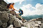 Mature couple hiking in mountains, Tannheim Valley, Austria