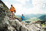 Mature couple hiking in mountains, Tannheim Valley, Austria