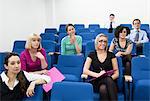 Colleagues sitting for presentation