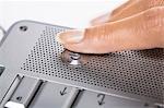 Woman's finger on a laptop