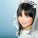 Little girl with wedding veil