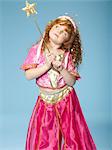 Little girl wearing a fairy costume