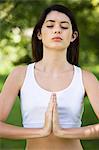 Woman practising yoga, outdoors