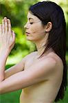 Young topless woman meditating