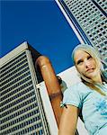 Teenage girl on building roof