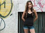 Teenage girl standing in the street