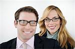 Portrait of business couple smiling at camera