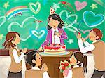 Students celebrating teacher's birthday in classroom
