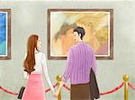 Couple looking at each other in art gallery