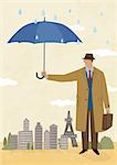 Businessman holding umbrella over city