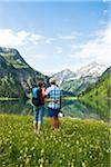 Couple Hiking by Lake, Vilsalpsee, Tannheim Valley, Tyrol, Austria