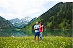 Mature couple hiking in mountains, Lake Vilsalpsee, Tannheim Valley, Austria