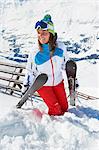 Young woman with skis