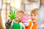 Boys with paint on their hands