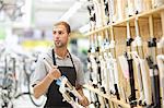 Worker in bicycle shop