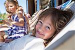 Girl relaxing in shade in summer