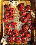 Roasted vine tomatoes in roasting tin