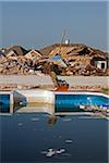 Chair beside Swimming Pool in Neightbourhood Damaged by Tornado, Moore, Oklahoma, USA.