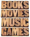 books, movies, music and games  - entertainment concept - collage of isolated words in vintage letterpress wood type printing blocks