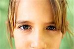 Young people and emotions, portrait of serious girl looking at camera. Closeup of eyes