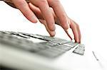 Closeup of blurred  male hands typing on computer keyboard.