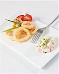 fried calamari and russian salad on white tray