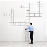 Career choices and opportunities concept - businessman with branched ladder