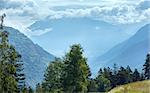 Summer misty mountain landscape (Alps, Switzerland)