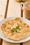 chapati traditional indian food with traditional items on background