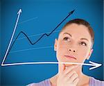 Woman looking at a chart against blue background