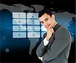Businessman standing in front of number pad hologram on world map