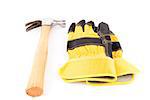 Pair of black and yellow builder's gloves and hammer
