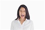 Screaming woman on white background