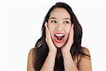Smiling woman yelling on white background