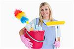 Cleaner holding a bucket with a broom in the white background