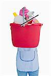 Maid showing a pink bucket in the white background