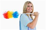 Smiling cleaning woman holding feather duster in the white background