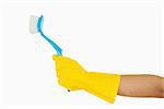 Woman's hand in rubber glove holding scrubbing brush