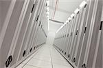 Empty hallway of tower servers in data center