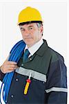 Portrait of confident electrician against white background