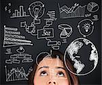 Brunette woman looking up on the picture of various computations and globe